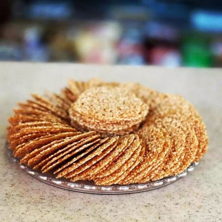 طرز تهیه سوهان عسلی کنجدی نازک با عسل و کره